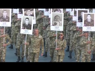 free после шествия в знак почтения светлой памяти наших шехидов отечественной войны плакаты были вручены семьям hd